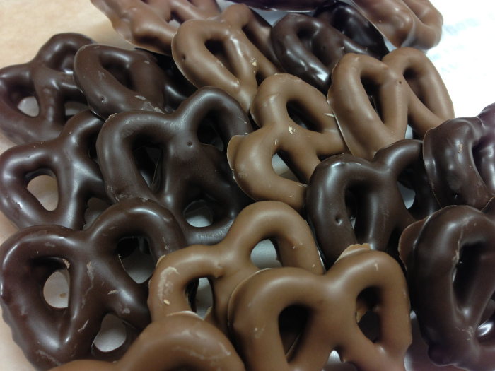 rows of chocolate covered pretzels in milk and dark chocolate